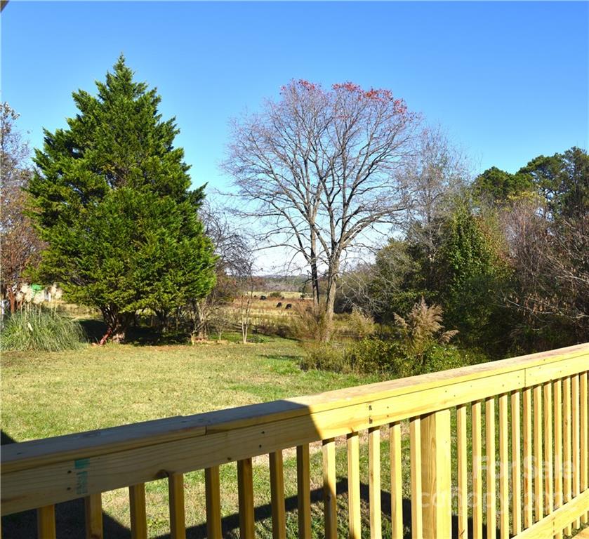 458 Kimmon Road Harmony, NC 28634 - Photo 23 of 23 a view of a yard with wooden fence