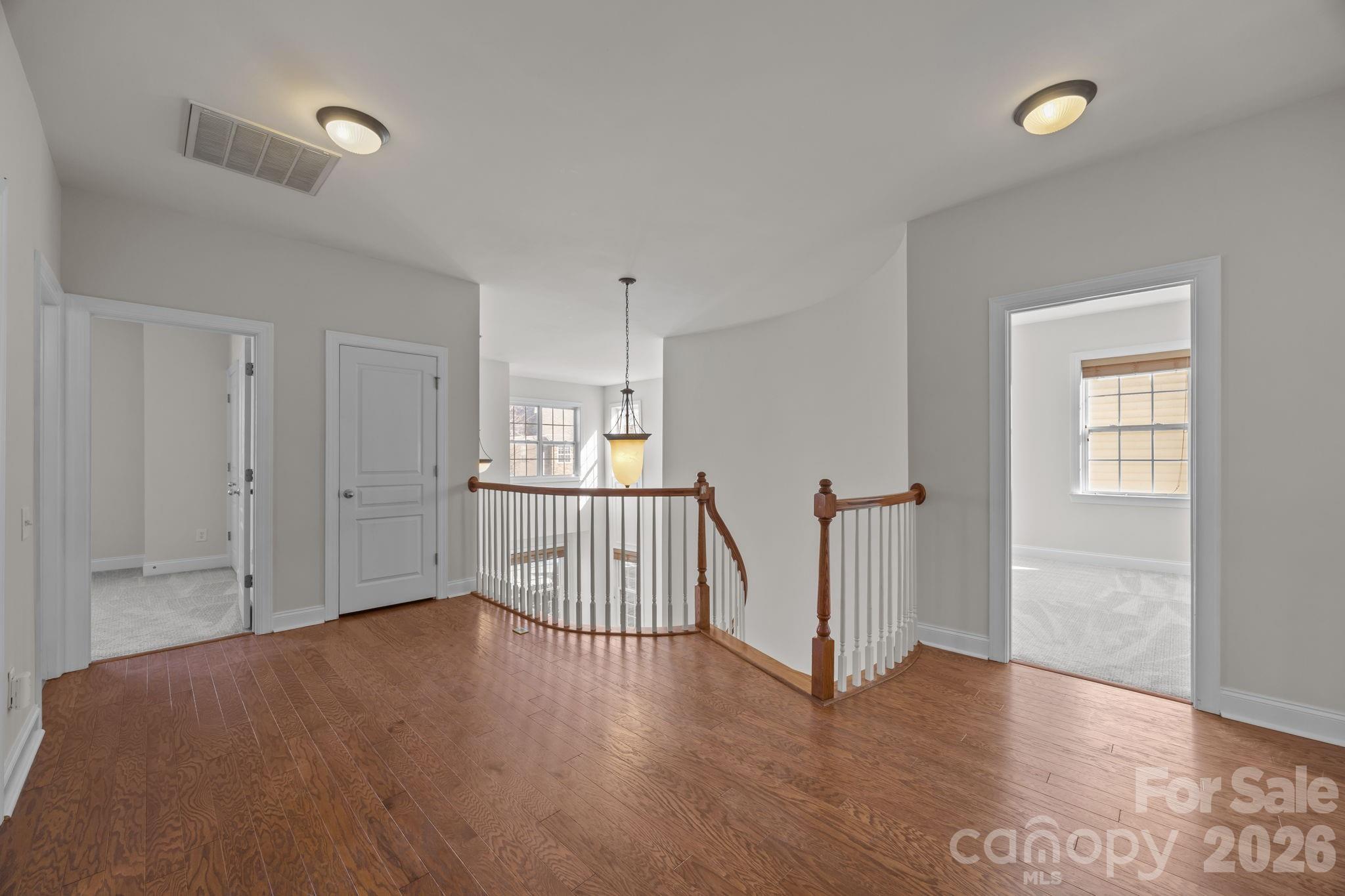 9429 Ridgeforest Drive Charlotte, NC 28277 - Photo 17 of 35 a view of entryway with wooden floor