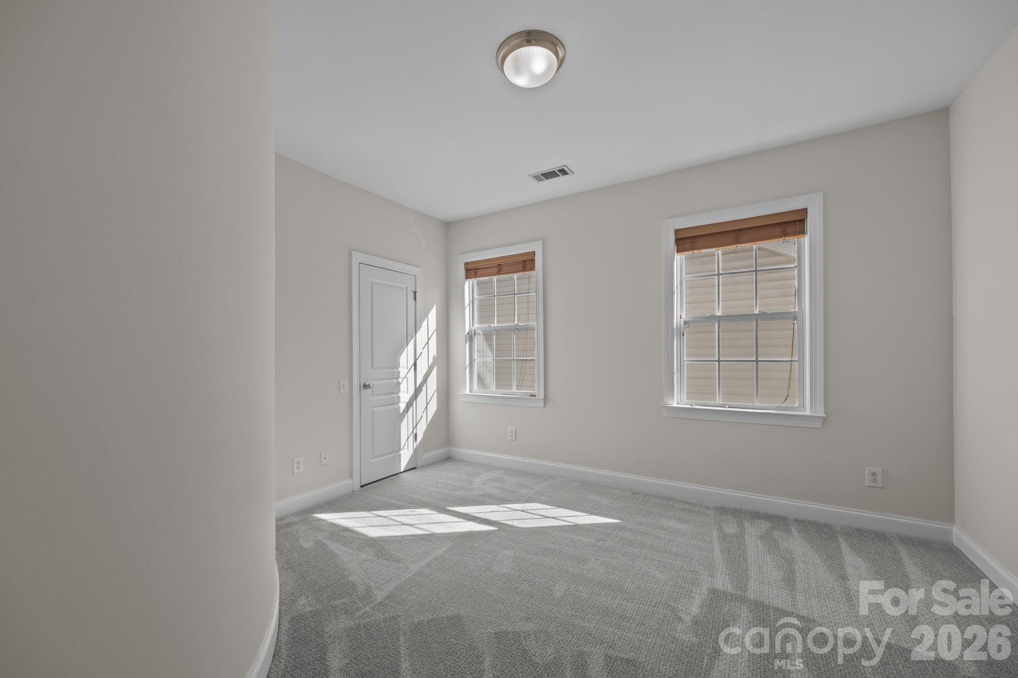 9429 Ridgeforest Drive Charlotte, NC 28277 - Photo 23 of 35 a view of empty room with window