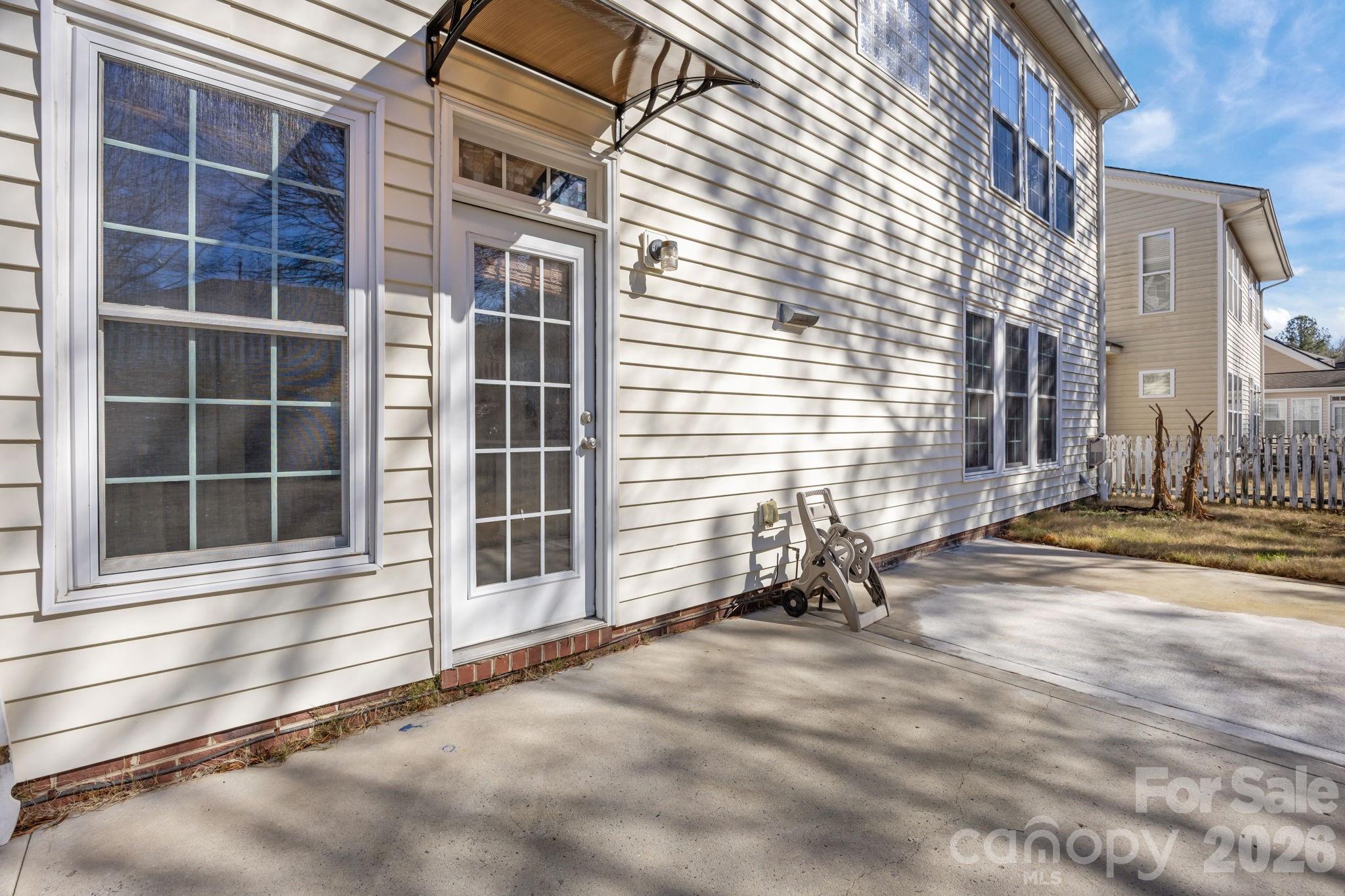 9429 Ridgeforest Drive Charlotte, NC 28277 - Photo 31 of 35 a view of a house with a patio