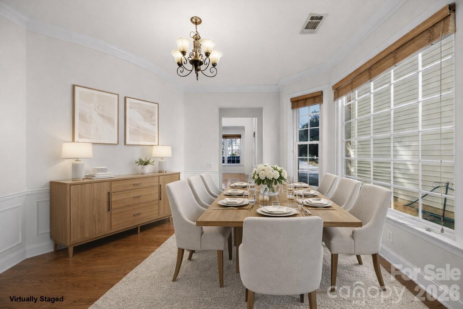 9429 Ridgeforest Drive Charlotte, NC 28277 - Photo 7 of 35 a view of a dining room with furniture and chandelier