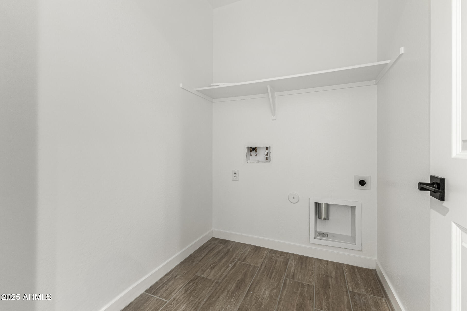 5423 West Royal Palm Road Glendale, AZ 85302 - Photo 24 of 32 a view of a room with wooden floor and a window