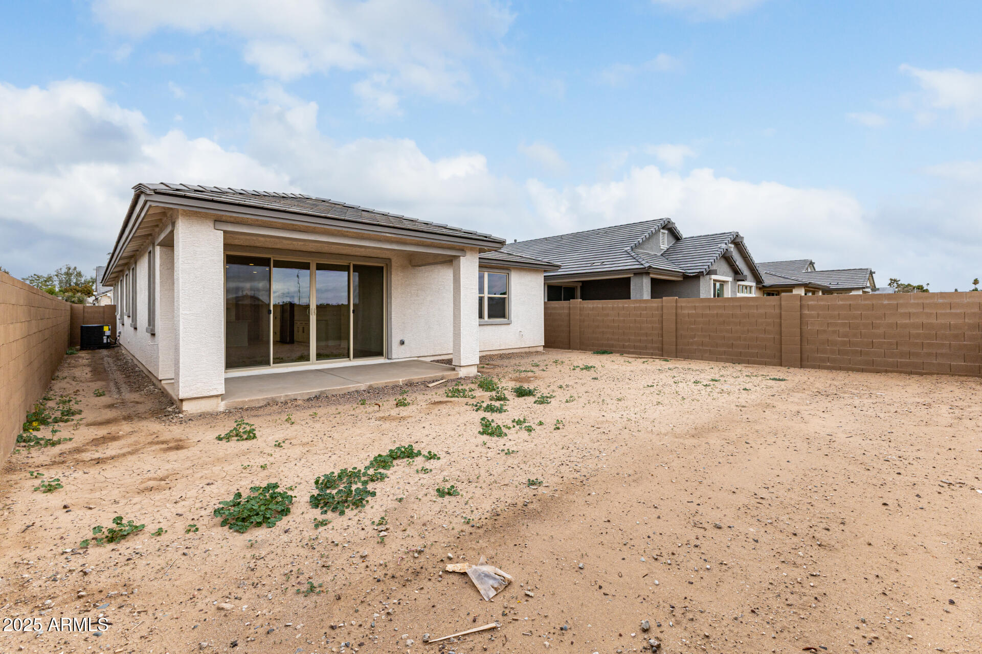 5423 West Royal Palm Road Glendale, AZ 85302 - Photo 30 of 32 a front view of a house with a yard