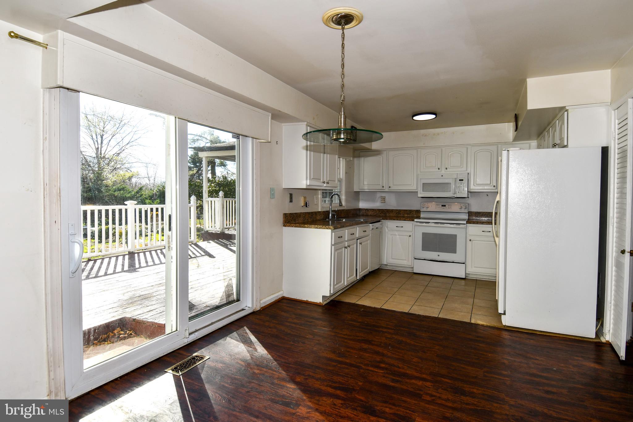 6 Beechvue Court Silver Spring, MD 20906 - Photo 14 of 42 Breakfast table area & kitchen