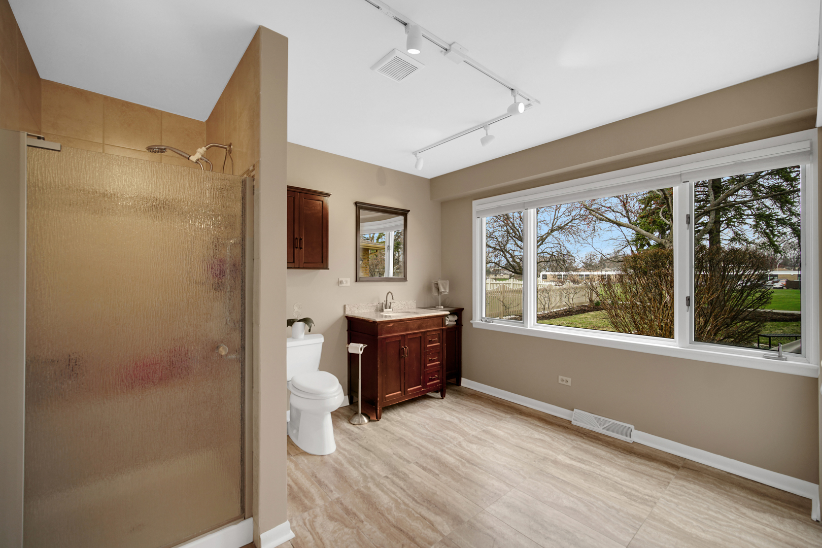 1102 Compton Point Addison, IL 60101 - Photo 12 of 34 a bathroom with a tub shower and sink