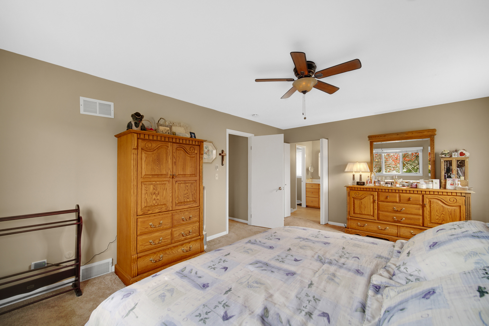 1102 Compton Point Addison, IL 60101 - Photo 14 of 34 a bedroom with a bed and a dresser