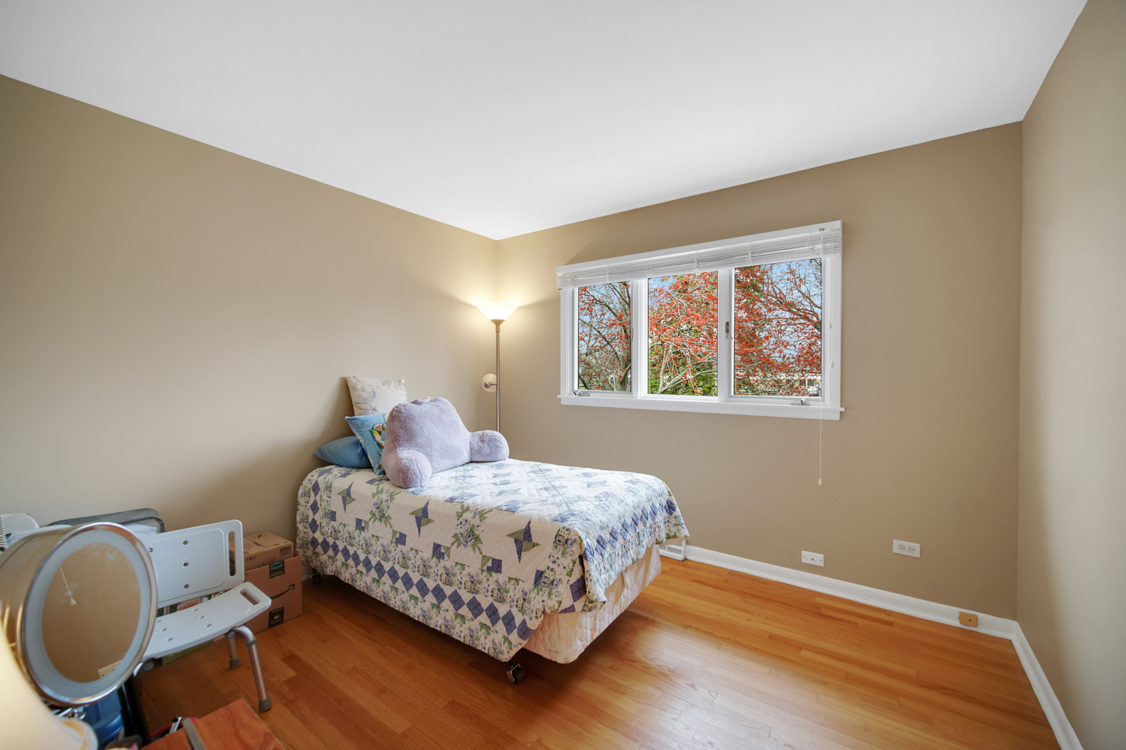 1102 Compton Point Addison, IL 60101 - Photo 17 of 34 a bedroom with bed and wooden floor