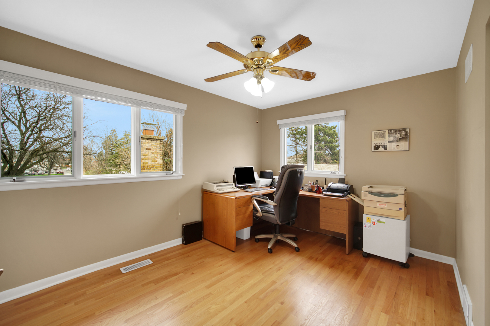 1102 Compton Point Addison, IL 60101 - Photo 18 of 34 a view of a workspace with furniture and a window