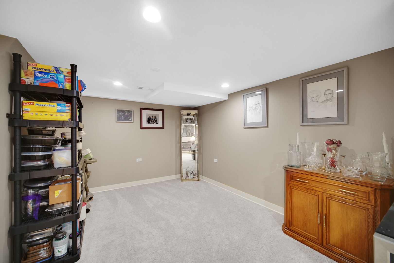 1102 Compton Point Addison, IL 60101 - Photo 24 of 34 a bedroom with a bed and a television