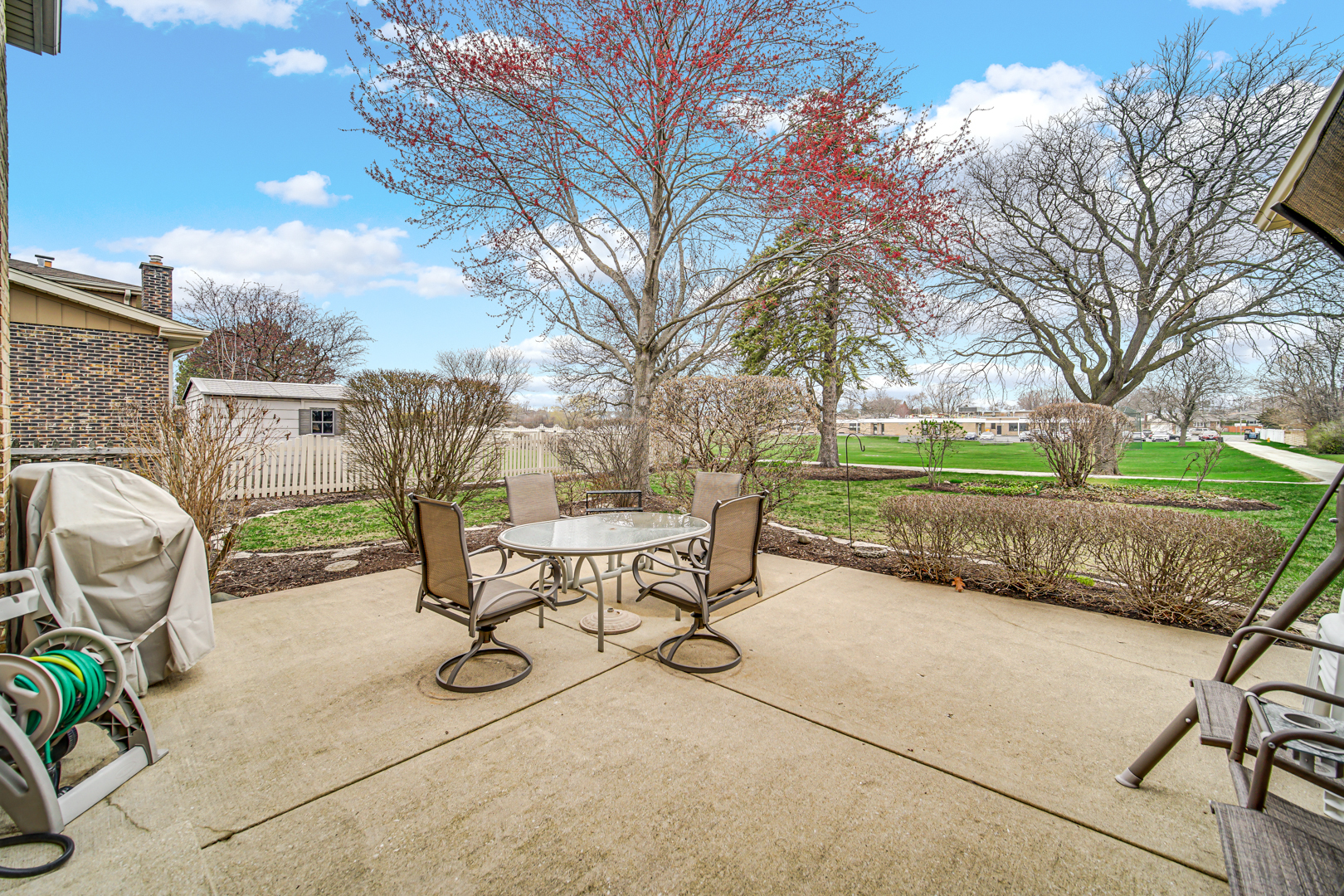 1102 Compton Point Addison, IL 60101 - Photo 27 of 34 a view of a backyard with sitting area