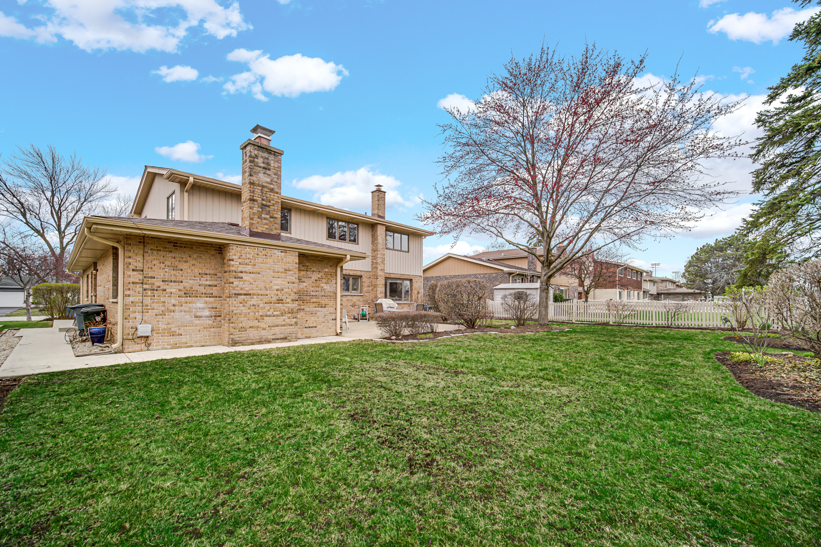 1102 Compton Point Addison, IL 60101 - Photo 29 of 34 a front view of a house with garden