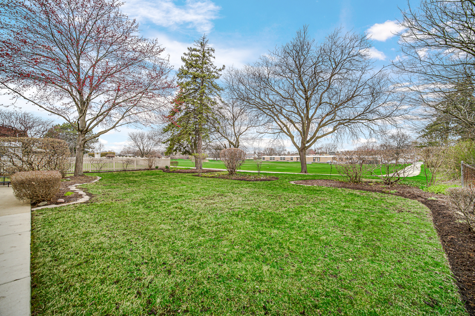 1102 Compton Point Addison, IL 60101 - Photo 30 of 34 a view of grassy field with benches