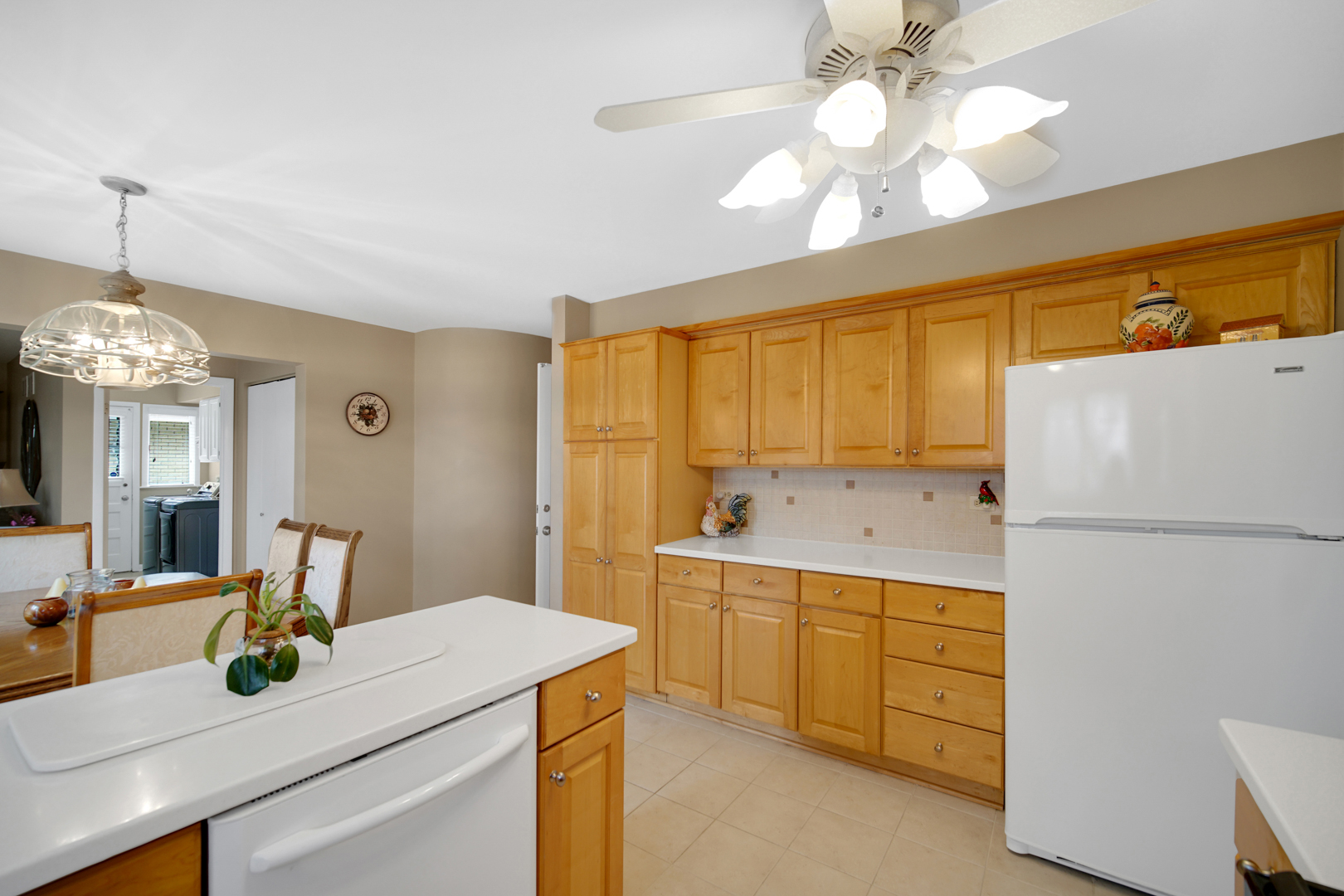 1102 Compton Point Addison, IL 60101 - Photo 6 of 34 a kitchen with a sink and a refrigerator