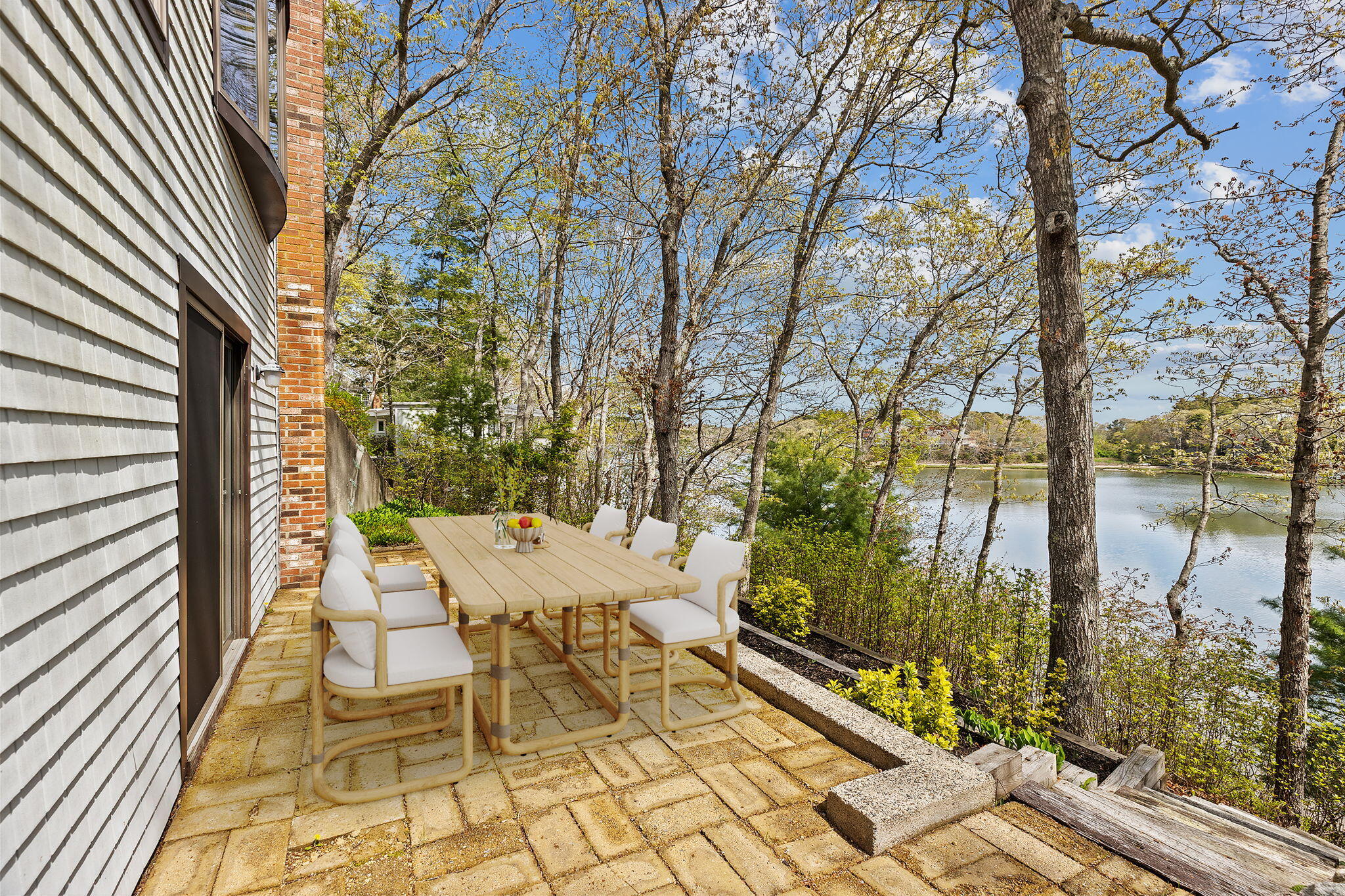 10 Quamhassett Road Buzzards Bay, MA 02532 - Photo 21 of 30 a view of an outdoor space with seating