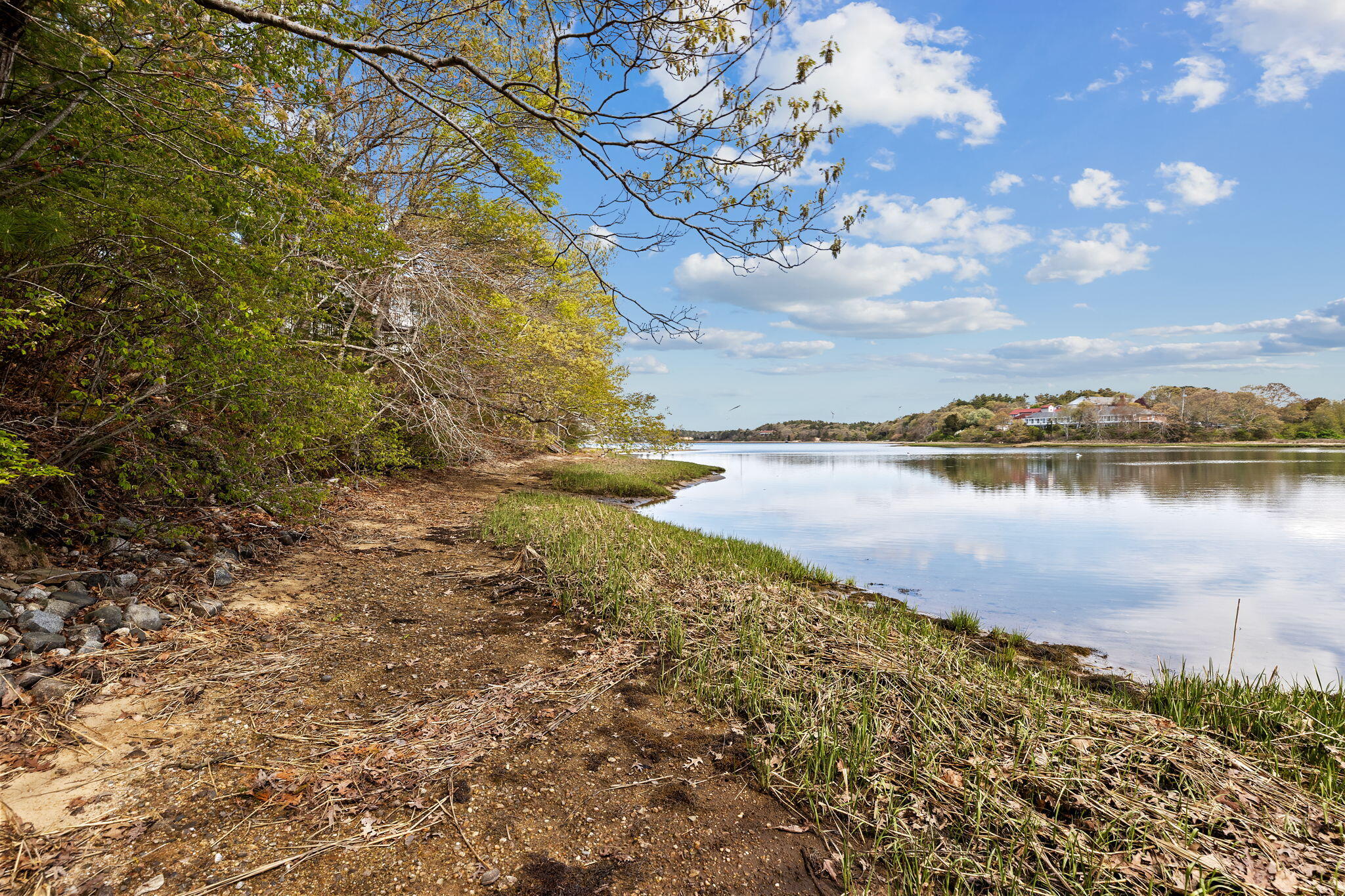 10 Quamhassett Road Buzzards Bay, MA 02532 - Photo 5 of 30 a view of a lake with houses in the back