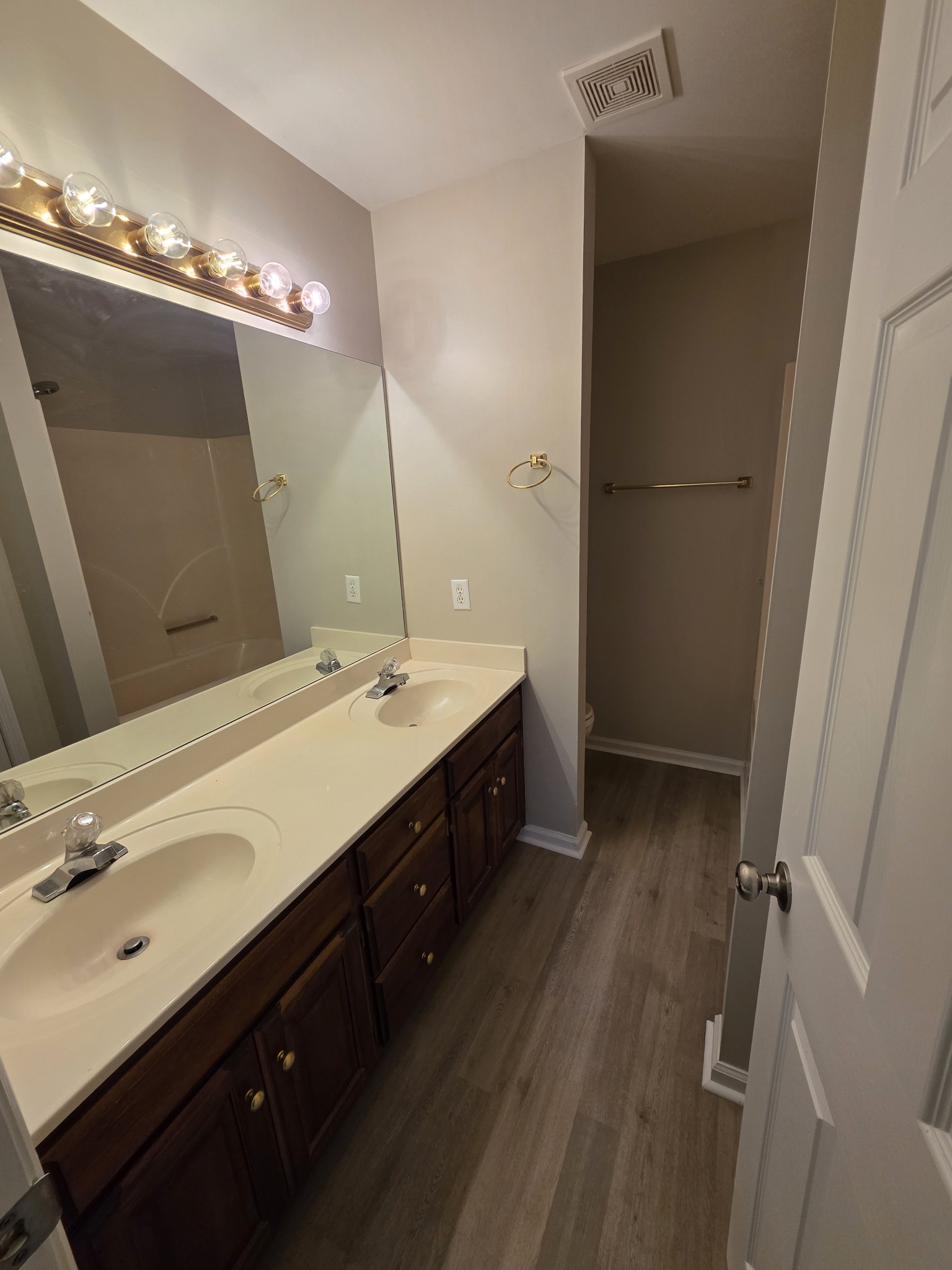 102 Cascade Lane Bell Buckle, TN 37020 - Photo 12 of 21 a spacious bathroom with a double vanity sink a large mirror and a shower