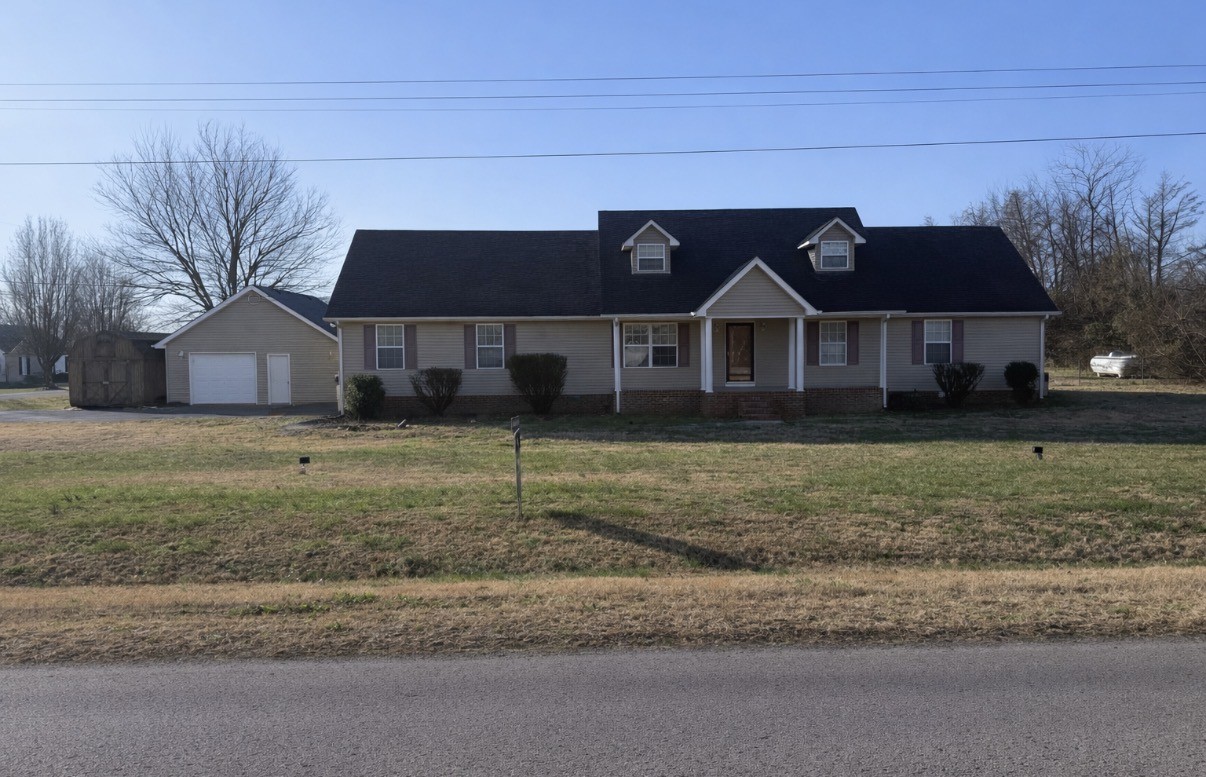 102 Cascade Lane Bell Buckle, TN 37020 - Photo 2 of 21 a front view of a house with a yard