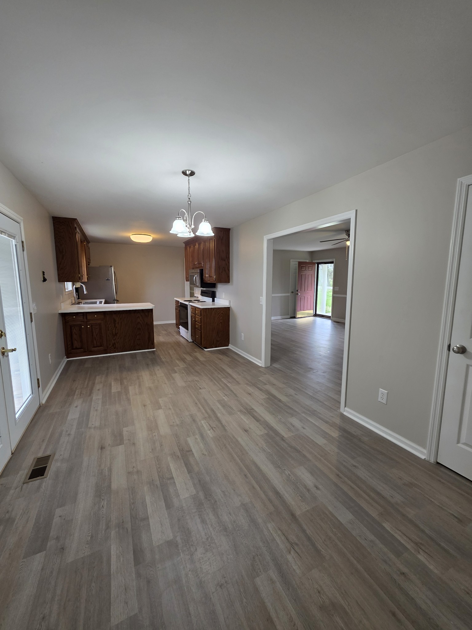 102 Cascade Lane Bell Buckle, TN 37020 - Photo 7 of 21 a view of a kitchen with cabinets and wooden floor