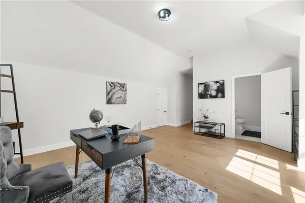 a living room with furniture and a table