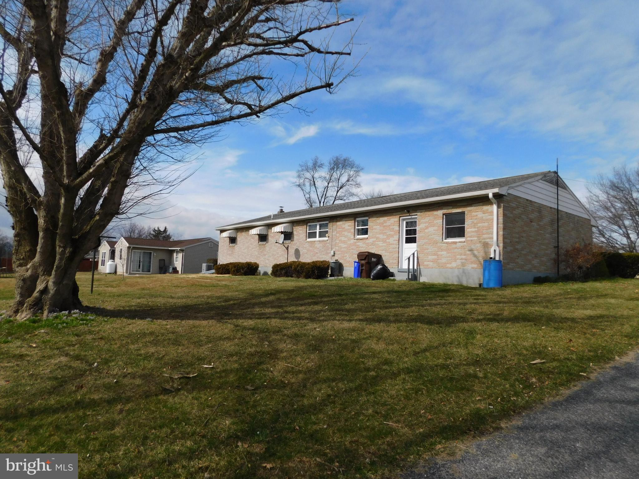 1569 Frank Road Chambersburg, PA 17202 - Photo 3 of 18 a front view of house with yard and green space