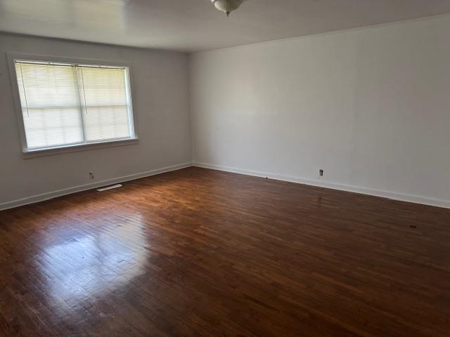1150 Pocahontas Road Pocahontas, TN 38061 - Photo 11 of 33 an empty room with wooden floor and windows