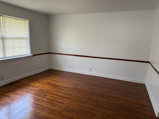 1150 Pocahontas Road Pocahontas, TN 38061 - Photo 12 of 33 a view of an empty room with wooden floor and a window