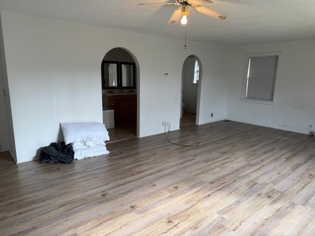 1150 Pocahontas Road Pocahontas, TN 38061 - Photo 14 of 33 a view of a room with wooden floor and ceiling fan