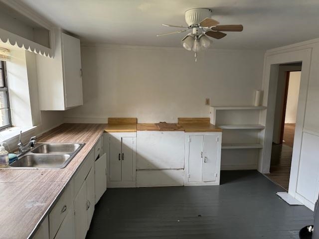 1150 Pocahontas Road Pocahontas, TN 38061 - Photo 15 of 33 a kitchen with a refrigerator sink and cabinets