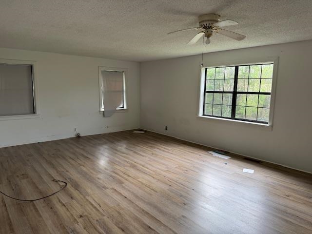 1150 Pocahontas Road Pocahontas, TN 38061 - Photo 16 of 33 an empty room with wooden floor and windows