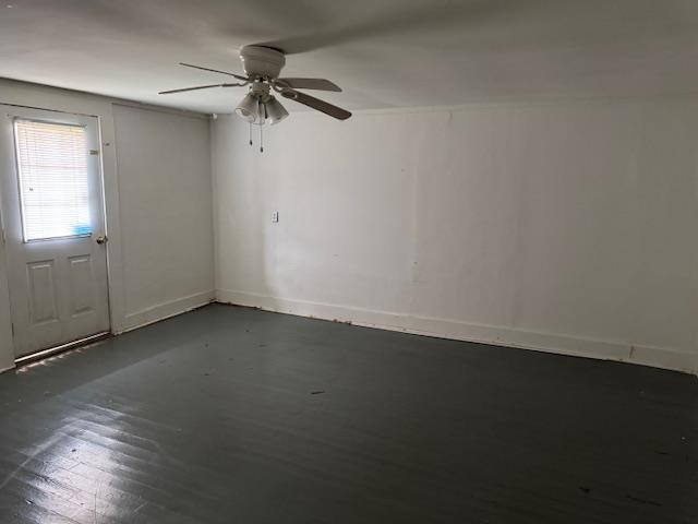 1150 Pocahontas Road Pocahontas, TN 38061 - Photo 18 of 33 an empty room with a ceiling fan and a window