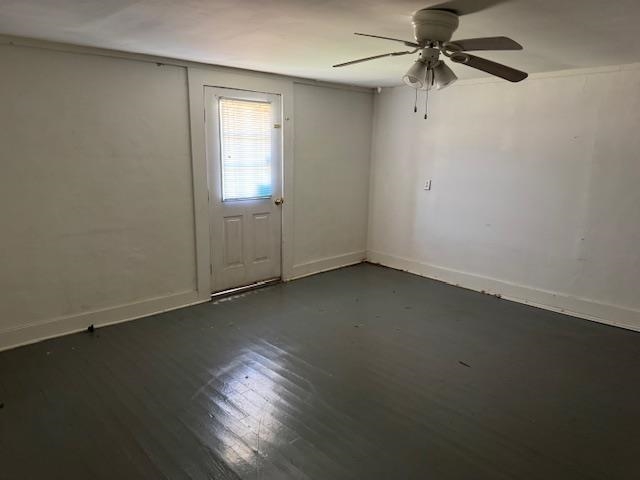1150 Pocahontas Road Pocahontas, TN 38061 - Photo 21 of 33 an empty room with a window and a ceiling fan
