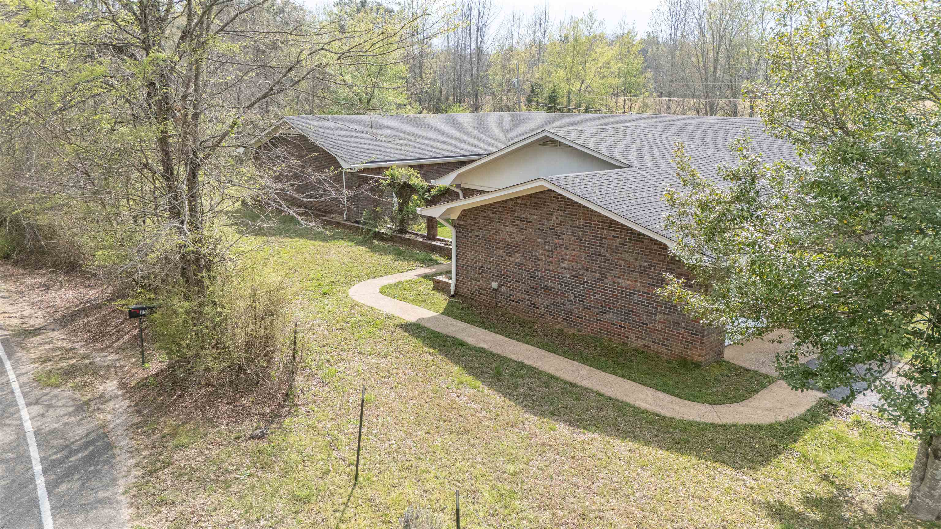 1150 Pocahontas Road Pocahontas, TN 38061 - Photo 4 of 33 a view of a yard with an outdoor space
