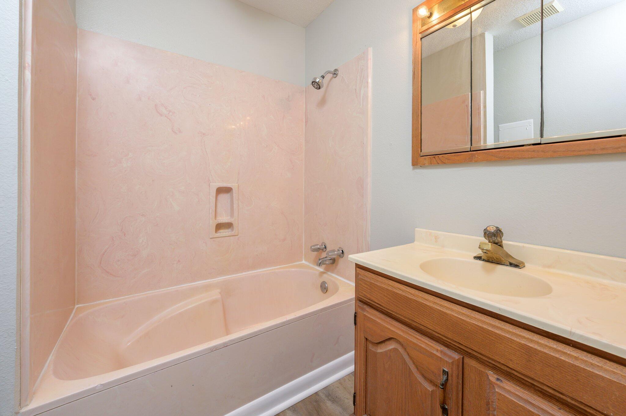 3970 Indian Mound Road Crestview, FL 32539 - Photo 13 of 33 a bathroom with a sink and a bathtub