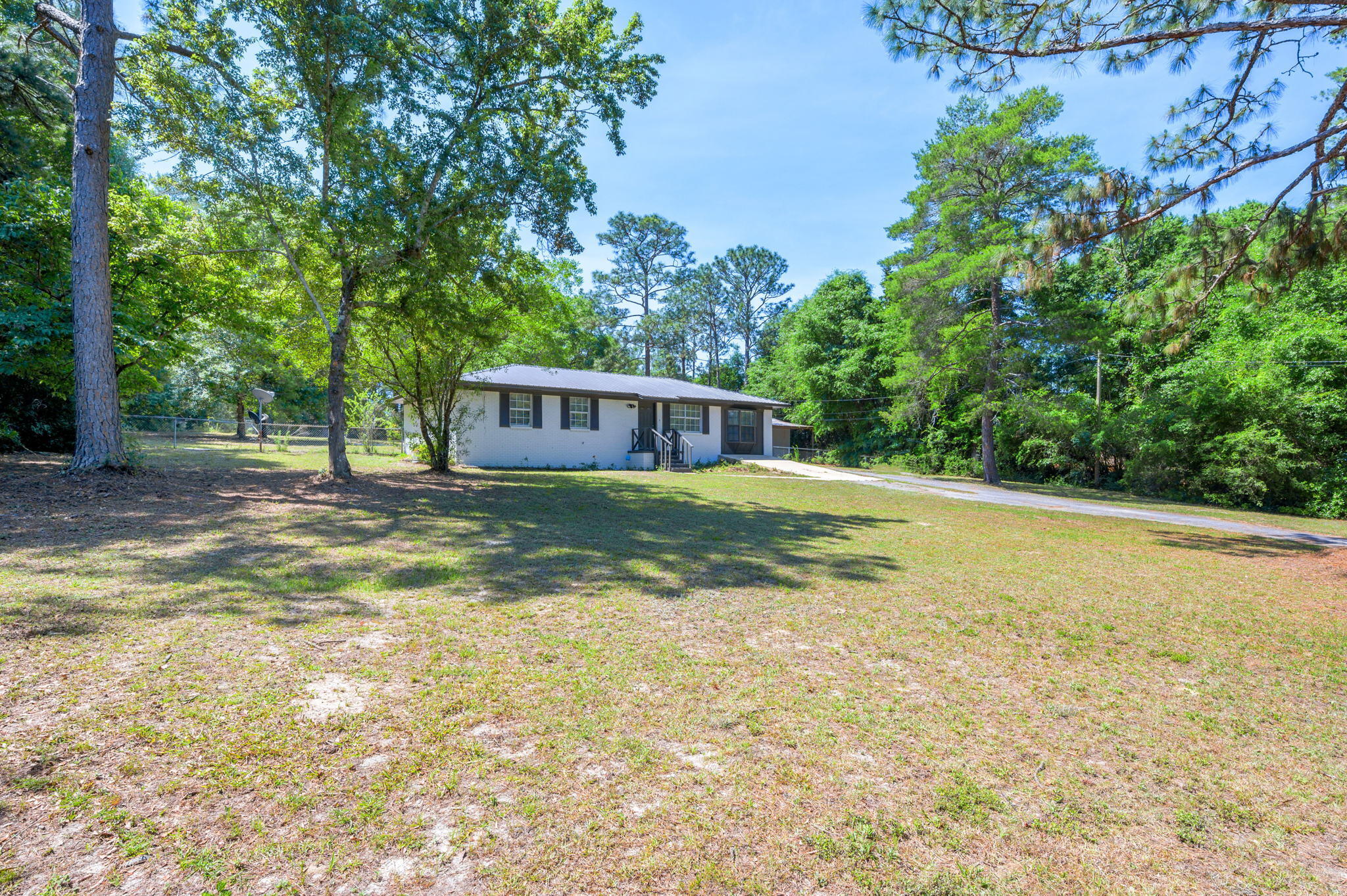 3970 Indian Mound Road Crestview, FL 32539 - Photo 2 of 33 a view of a house with a yard