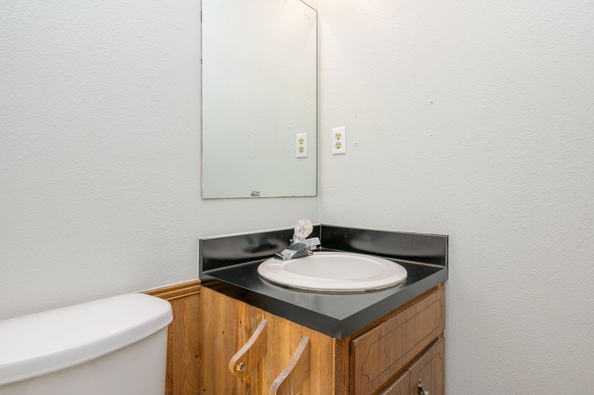 3970 Indian Mound Road Crestview, FL 32539 - Photo 24 of 33 a bathroom with a sink and a toilet