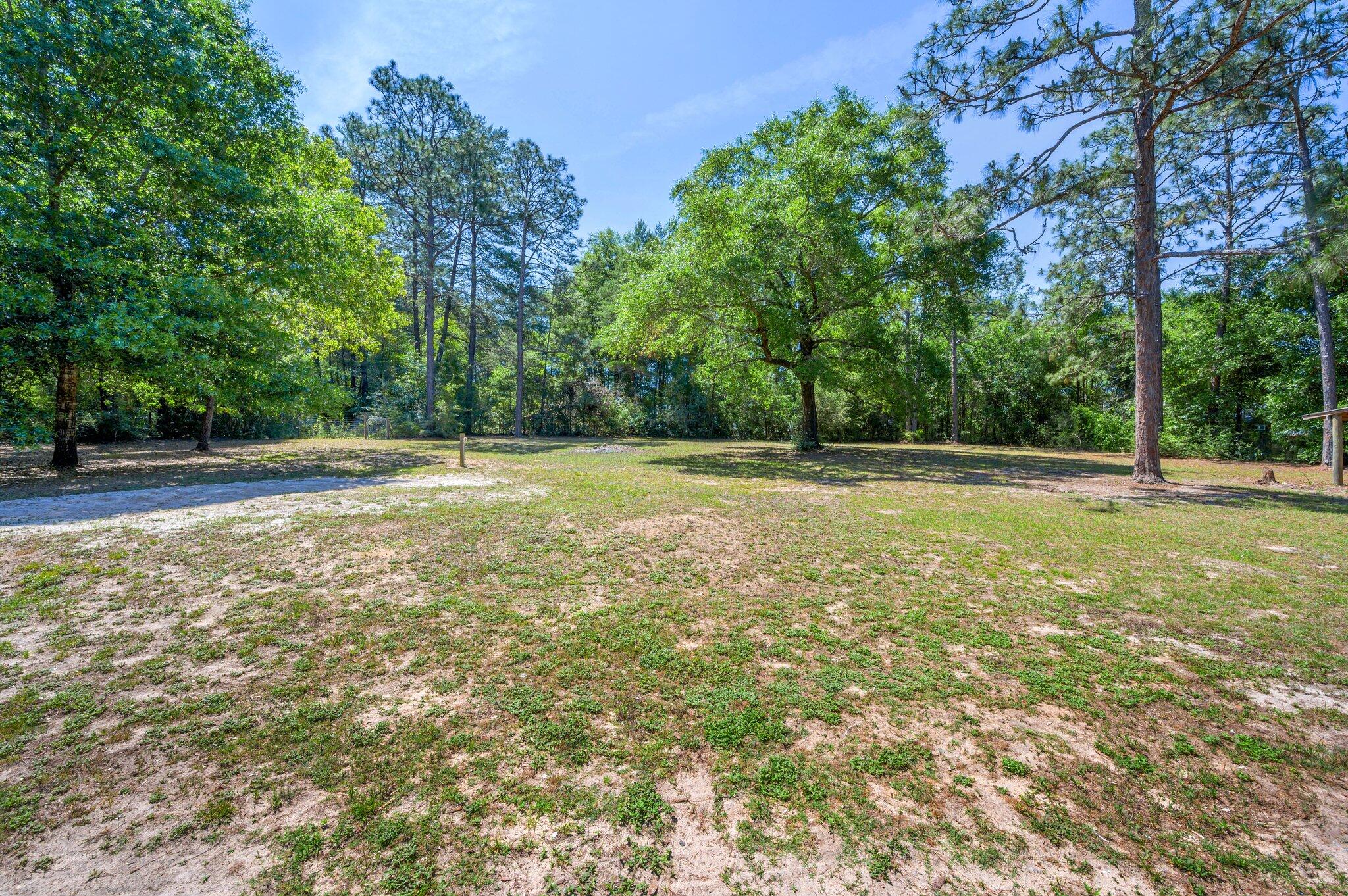 3970 Indian Mound Road Crestview, FL 32539 - Photo 27 of 33 a view of outdoor space with deck and yard