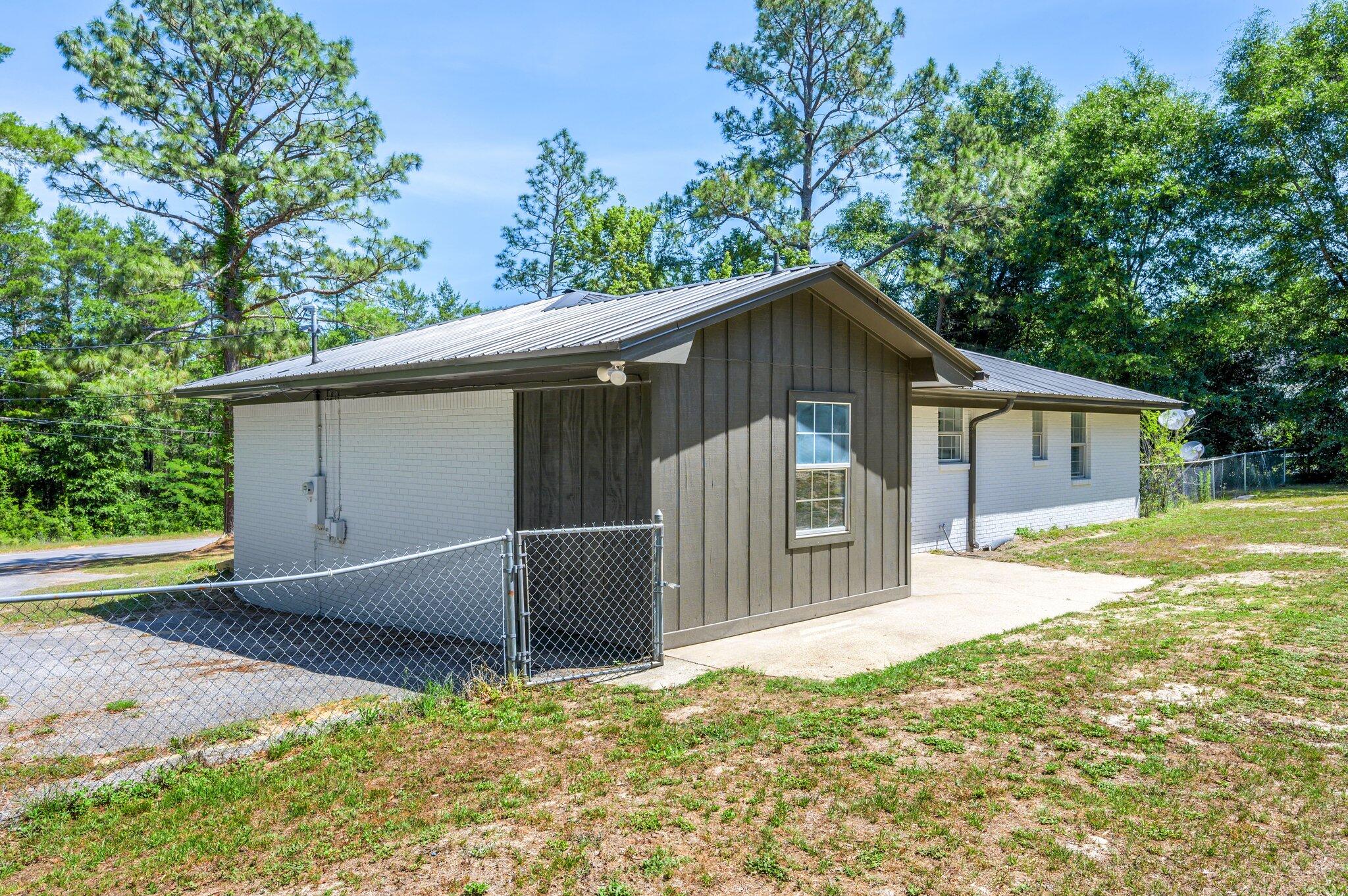3970 Indian Mound Road Crestview, FL 32539 - Photo 29 of 33 a view of a house with a yard and large tree