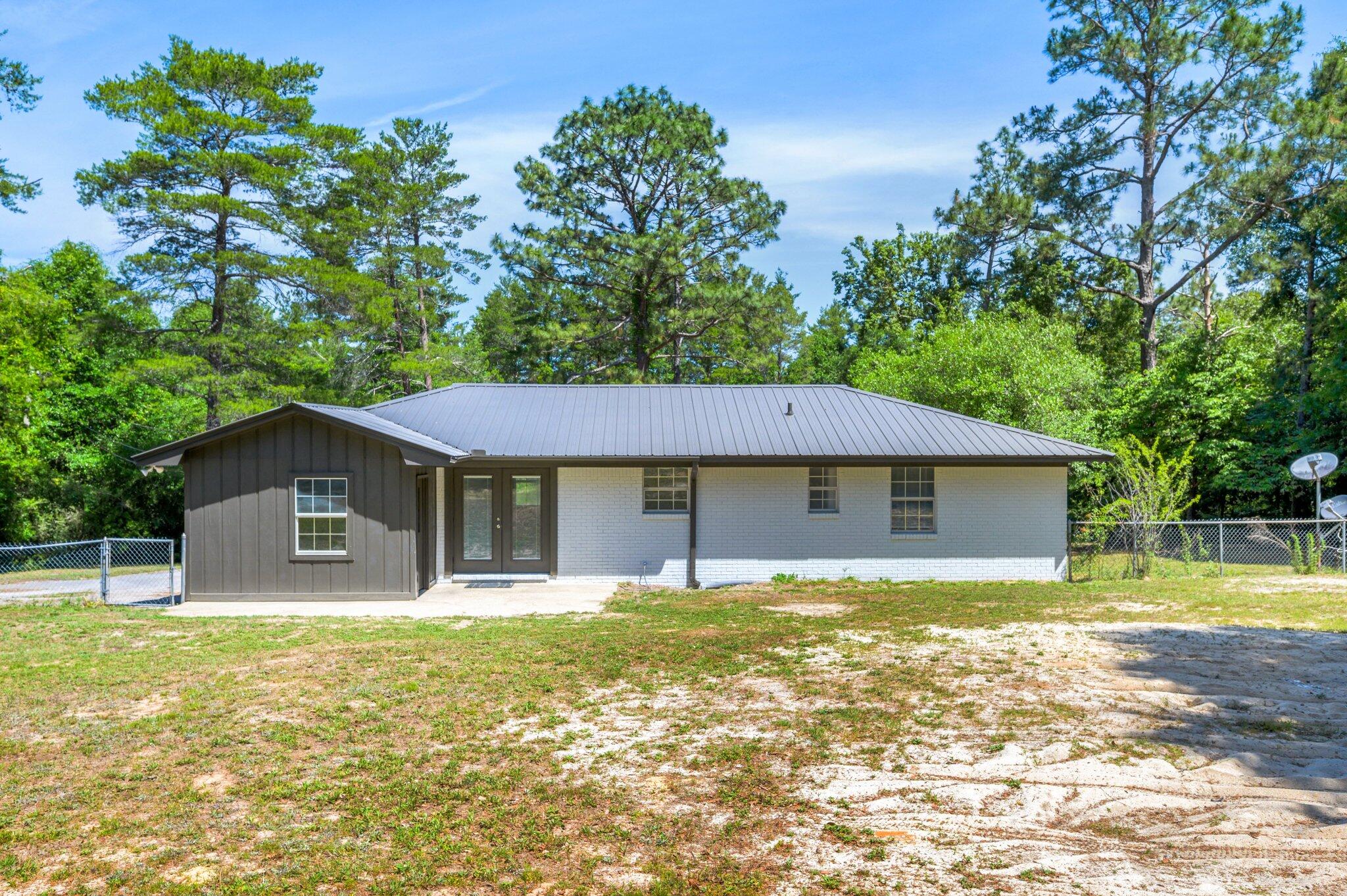 3970 Indian Mound Road Crestview, FL 32539 - Photo 30 of 33 a house with swimming pool in front of it