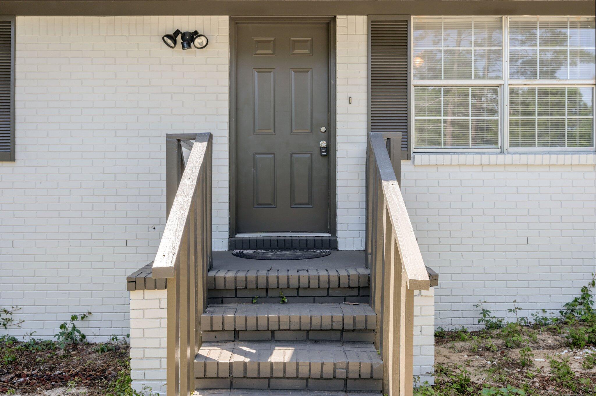 3970 Indian Mound Road Crestview, FL 32539 - Photo 4 of 33 a view of a balcony with door