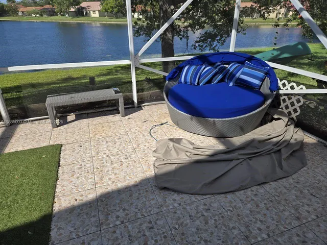 a view of a chairs in front of house
