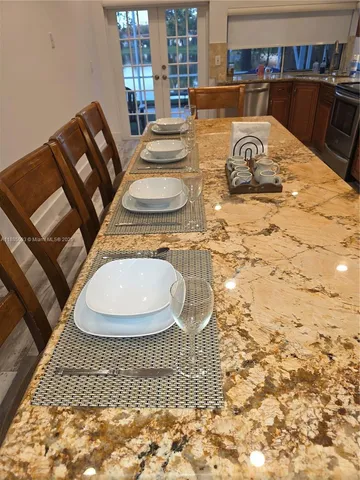 a view of a dining room with furniture