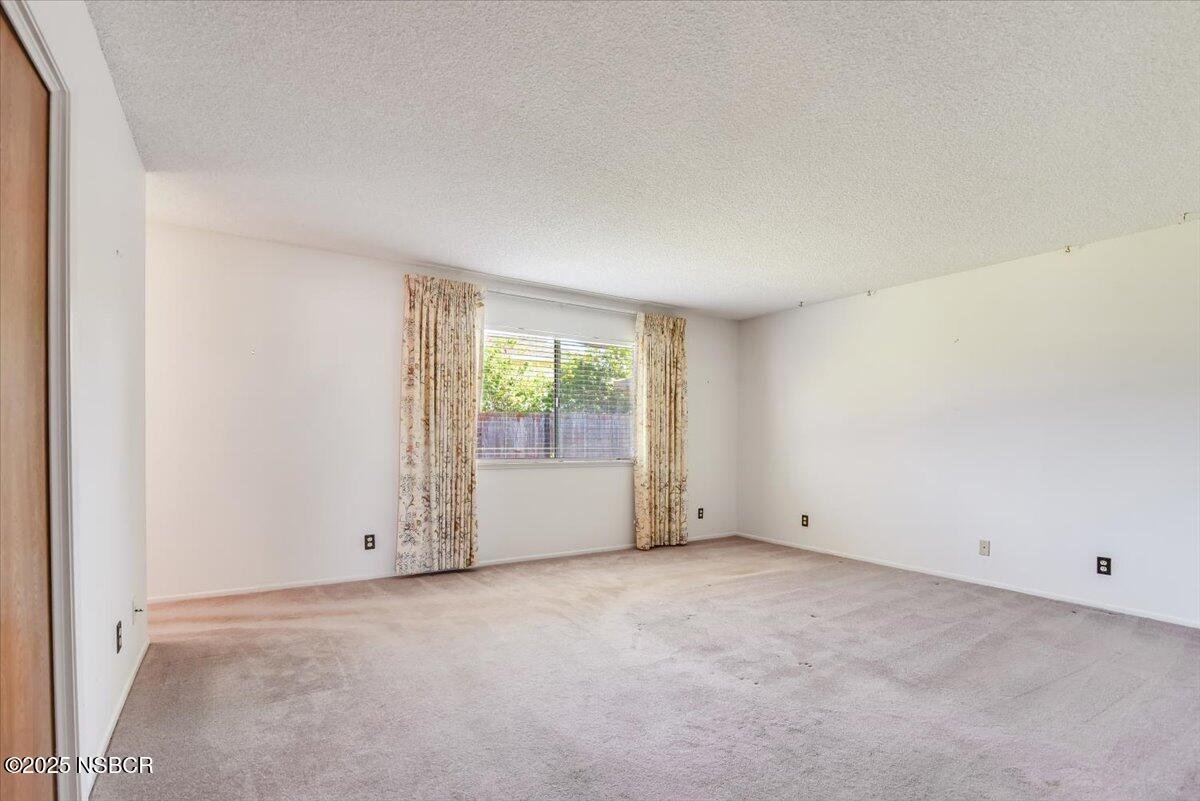 244 Pegasus Avenue Lompoc, CA 93436 - Photo 15 of 28 an empty room with windows