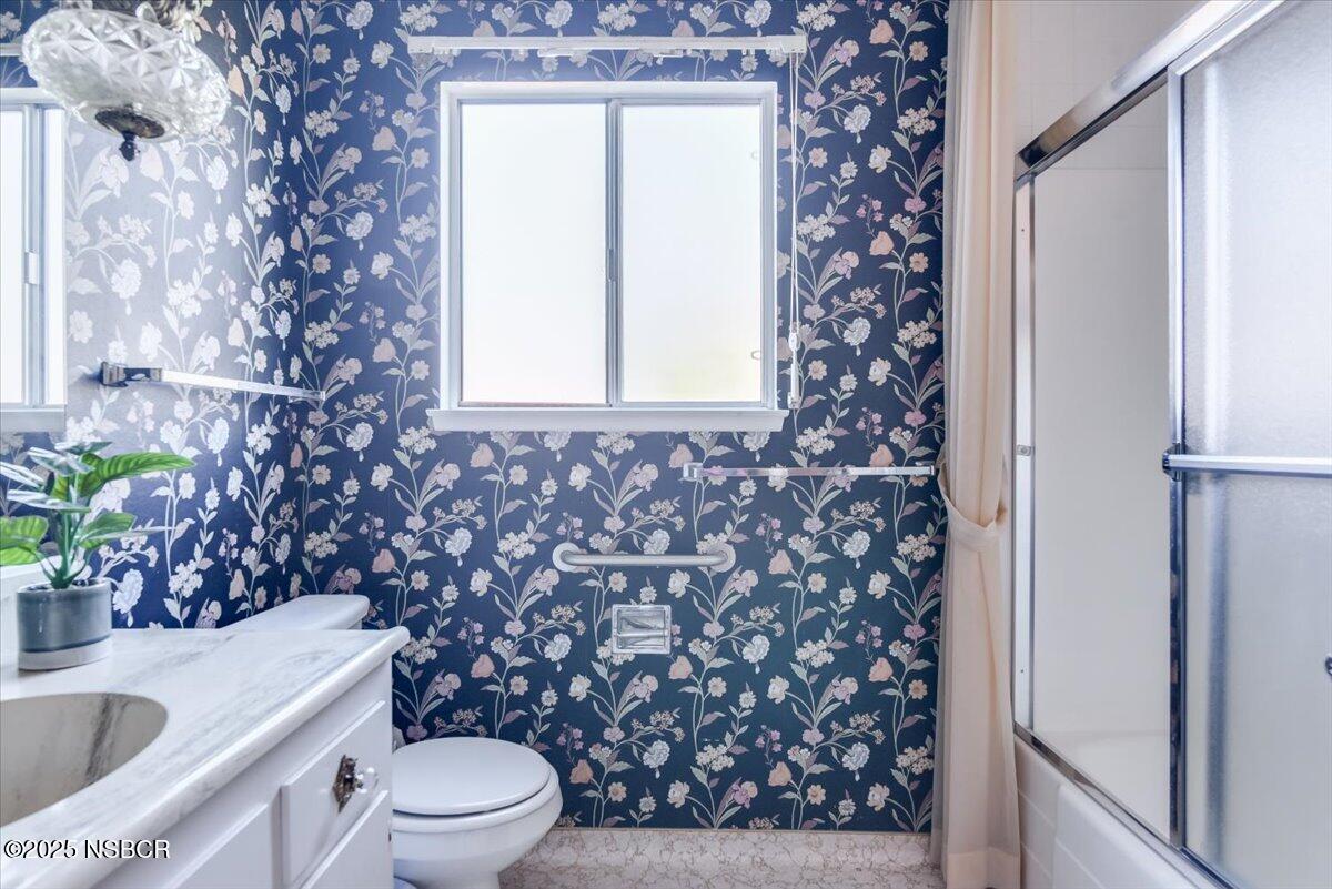 244 Pegasus Avenue Lompoc, CA 93436 - Photo 21 of 28 a bathroom with a sink toilet and shower