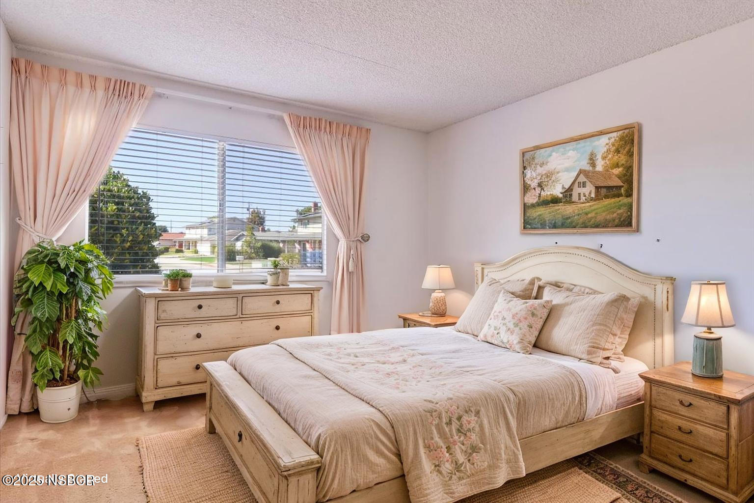 244 Pegasus Avenue Lompoc, CA 93436 - Photo 22 of 28 a spacious bedroom with a bed and a large window