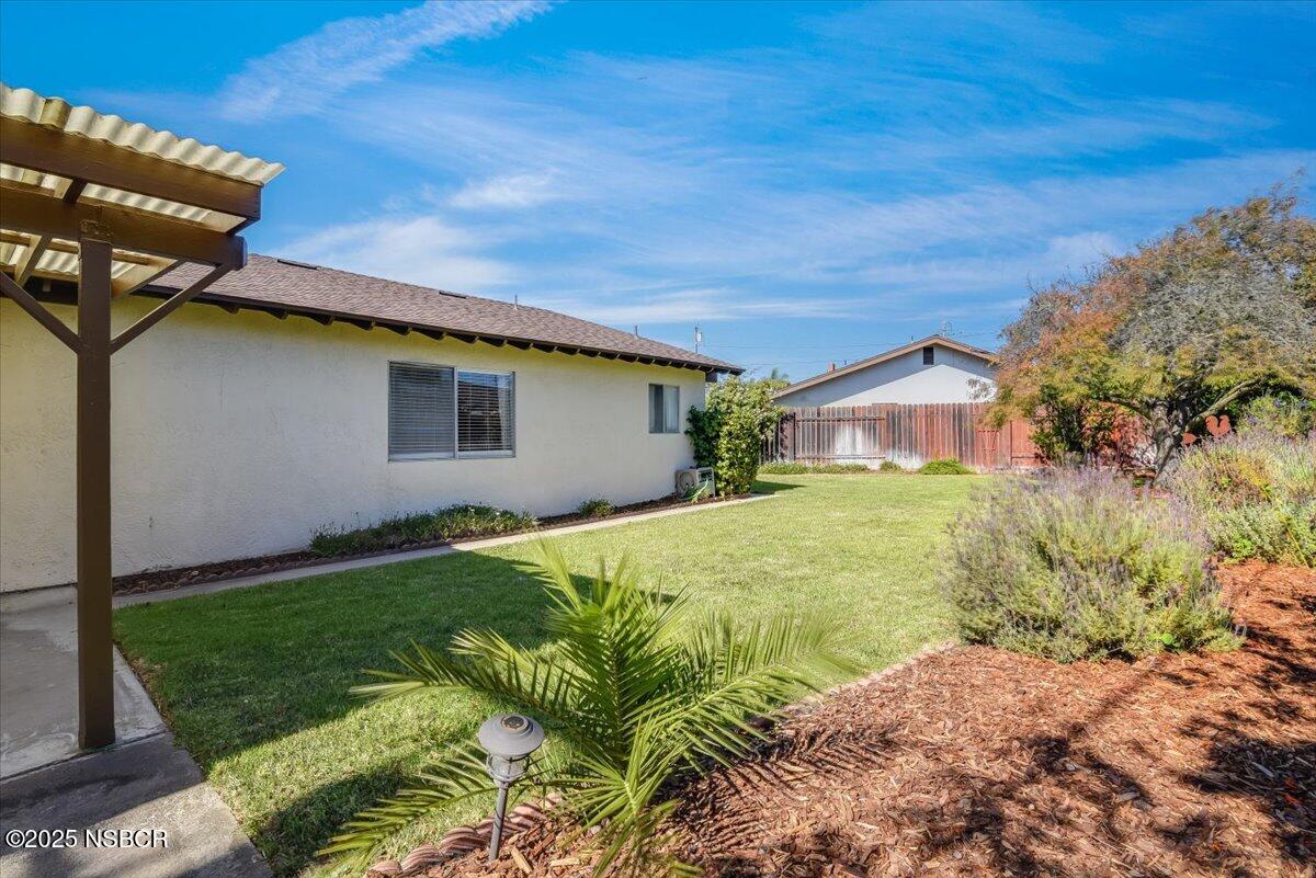 244 Pegasus Avenue Lompoc, CA 93436 - Photo 24 of 28 a house view with a garden space