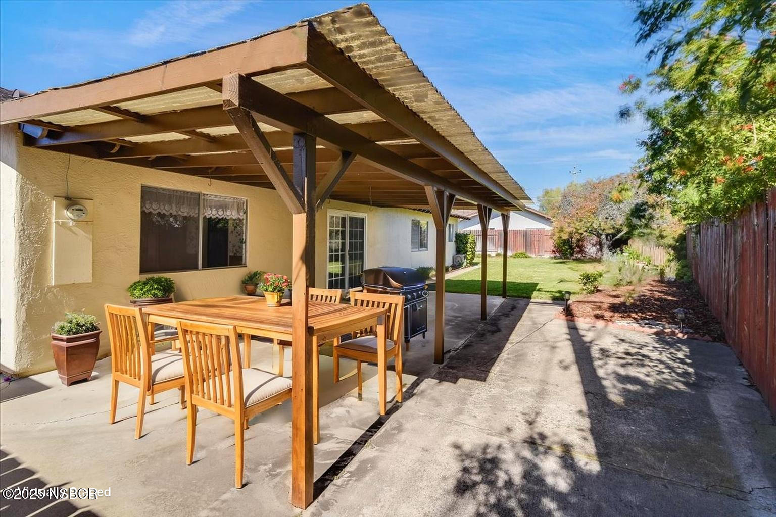244 Pegasus Avenue Lompoc, CA 93436 - Photo 28 of 28 a view of an house with backyard and furniture