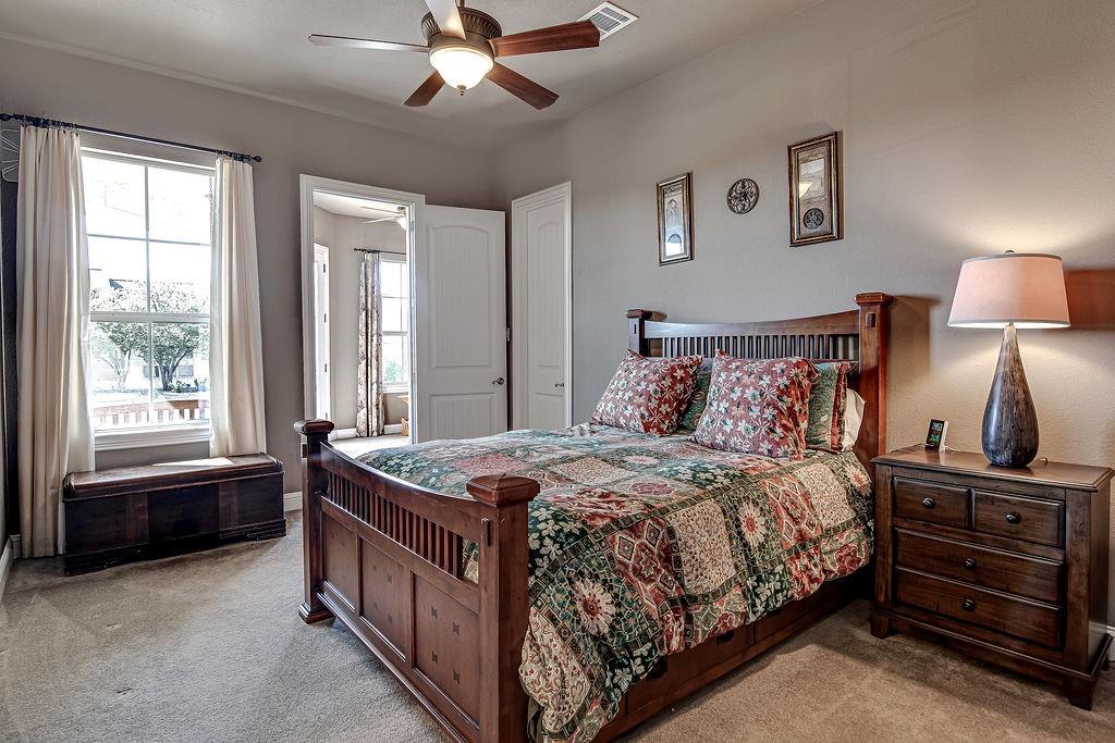 117 Citation Drive Cresson, TX 76035 - Photo 24 of 40 Carpeted bedroom with a ceiling fan and baseboards