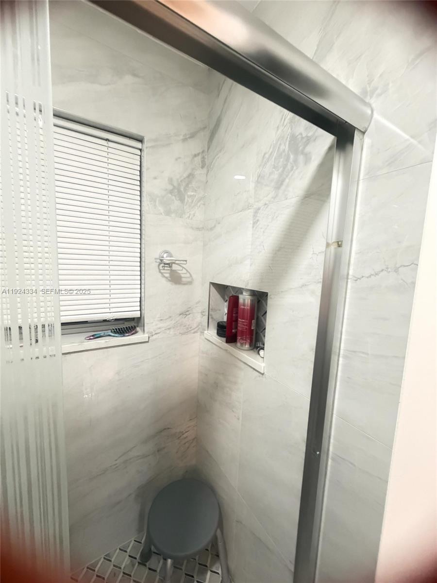 3001 Northwest 4th Terrace, Unit 158 Pompano Beach, FL 33064 - Photo 13 of 23 a bathroom with a sink and a toilet