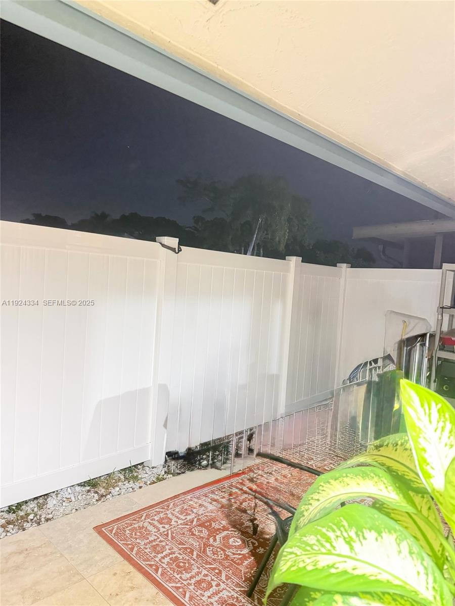 3001 Northwest 4th Terrace, Unit 158 Pompano Beach, FL 33064 - Photo 21 of 23 a view of a backyard