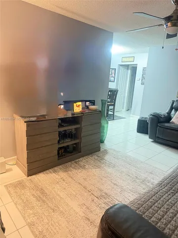 a view of room with wooden floor